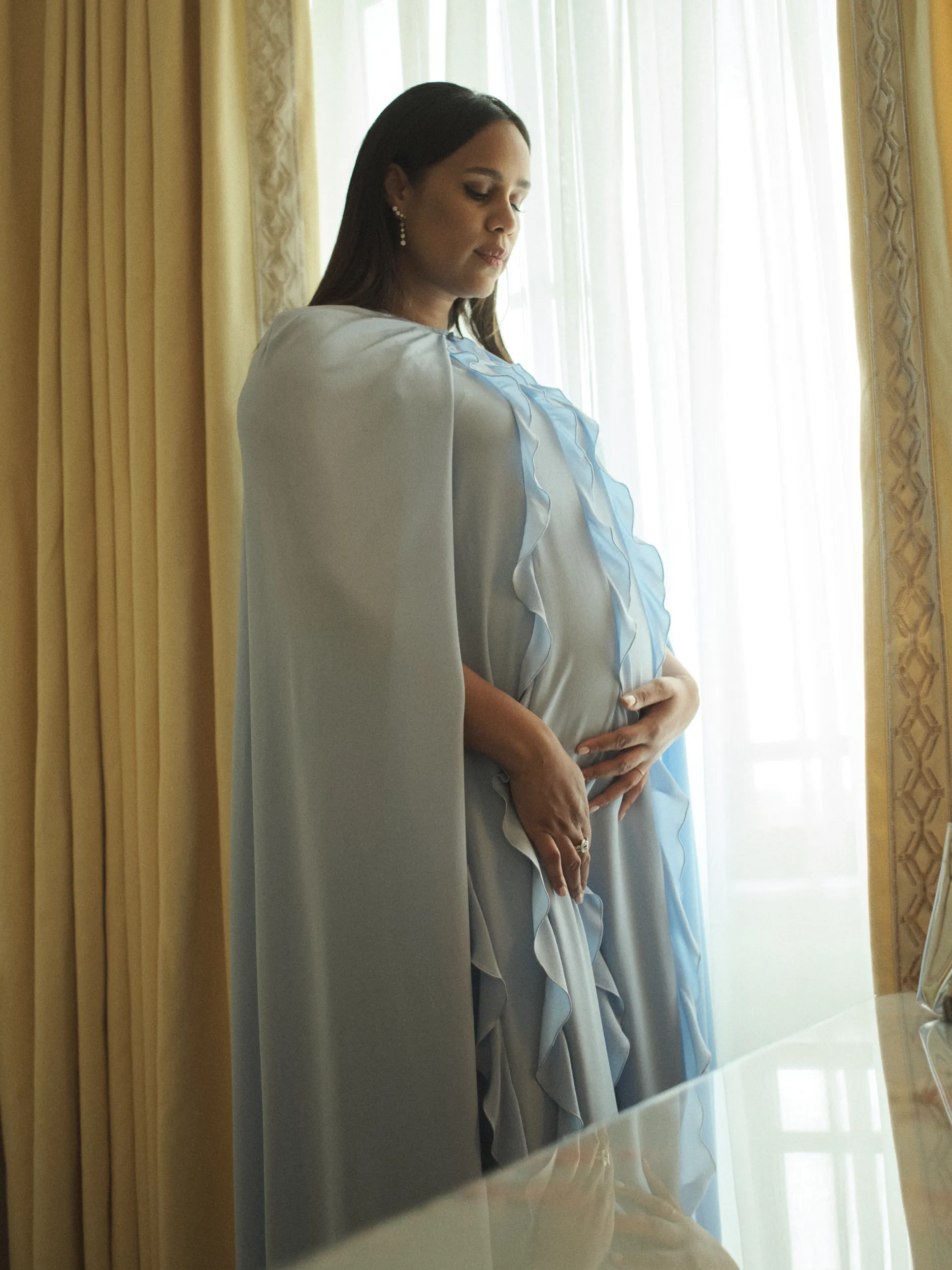 Image may contain Zawe Ashton Adult Person Fashion Cape Clothing Face and Head