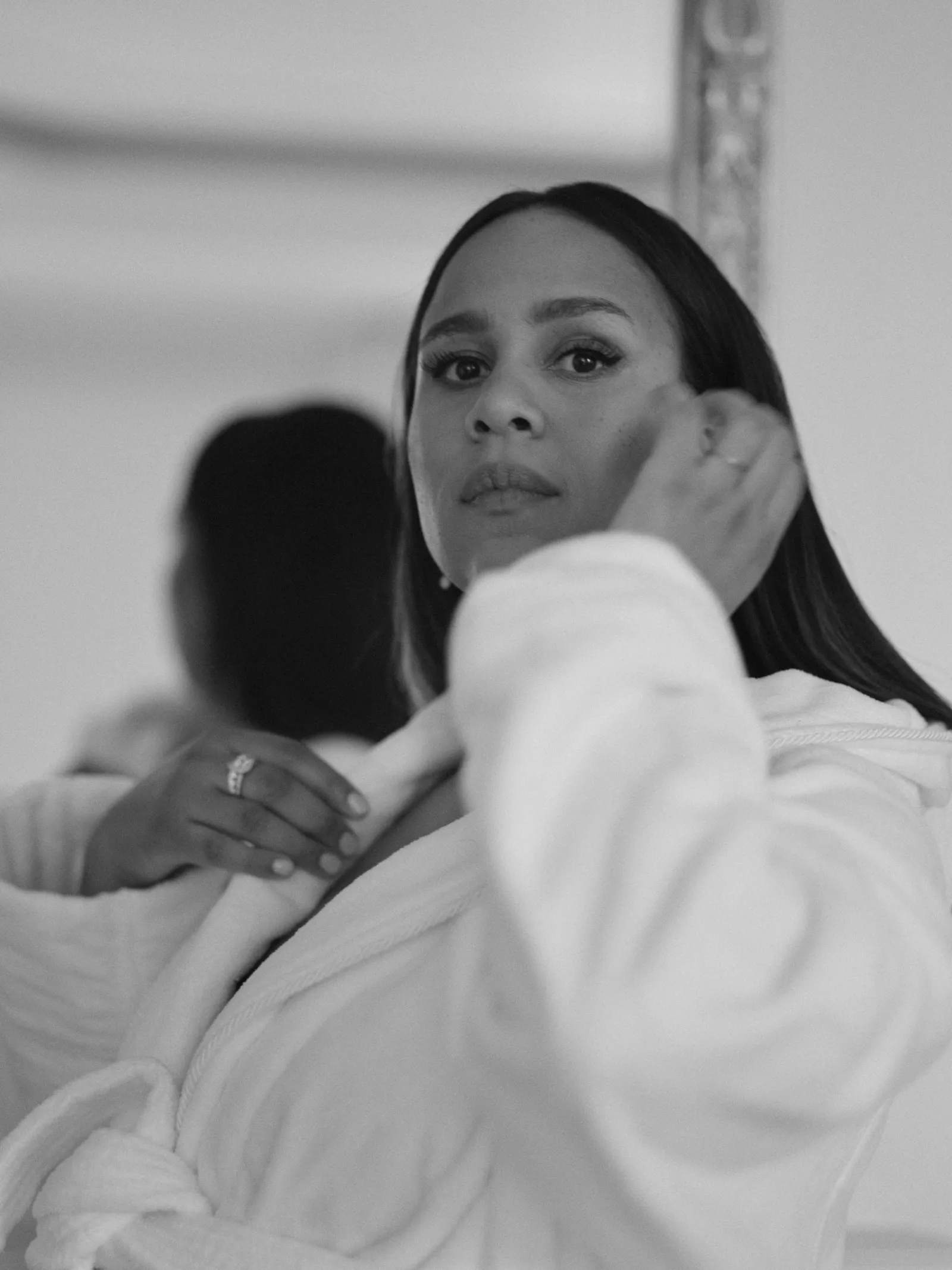 Image may contain Zawe Ashton Body Part Finger Hand Person Adult Face Head Photography and Portrait
