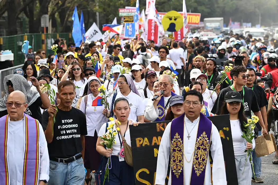 Filipinos protest corruption on anniversary of Ferdinand Marcos' ouster