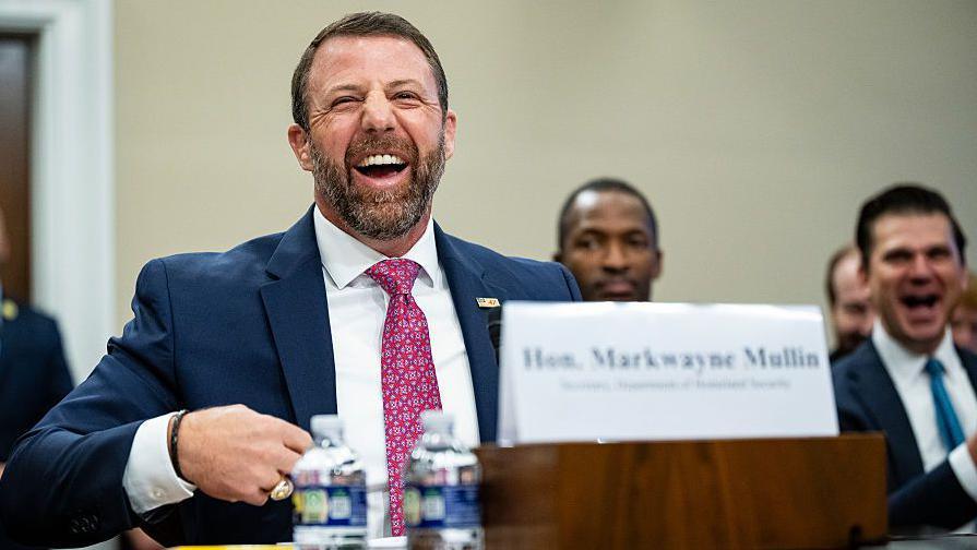 Homeland Security secretary Markwayne Mullin smiles during a House Appropriations Subcommittee hearing in Washington DC on 25 June 2026