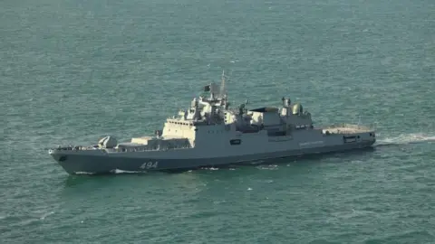Russian frigate Admiral Grigorovich, a large grey vessel 