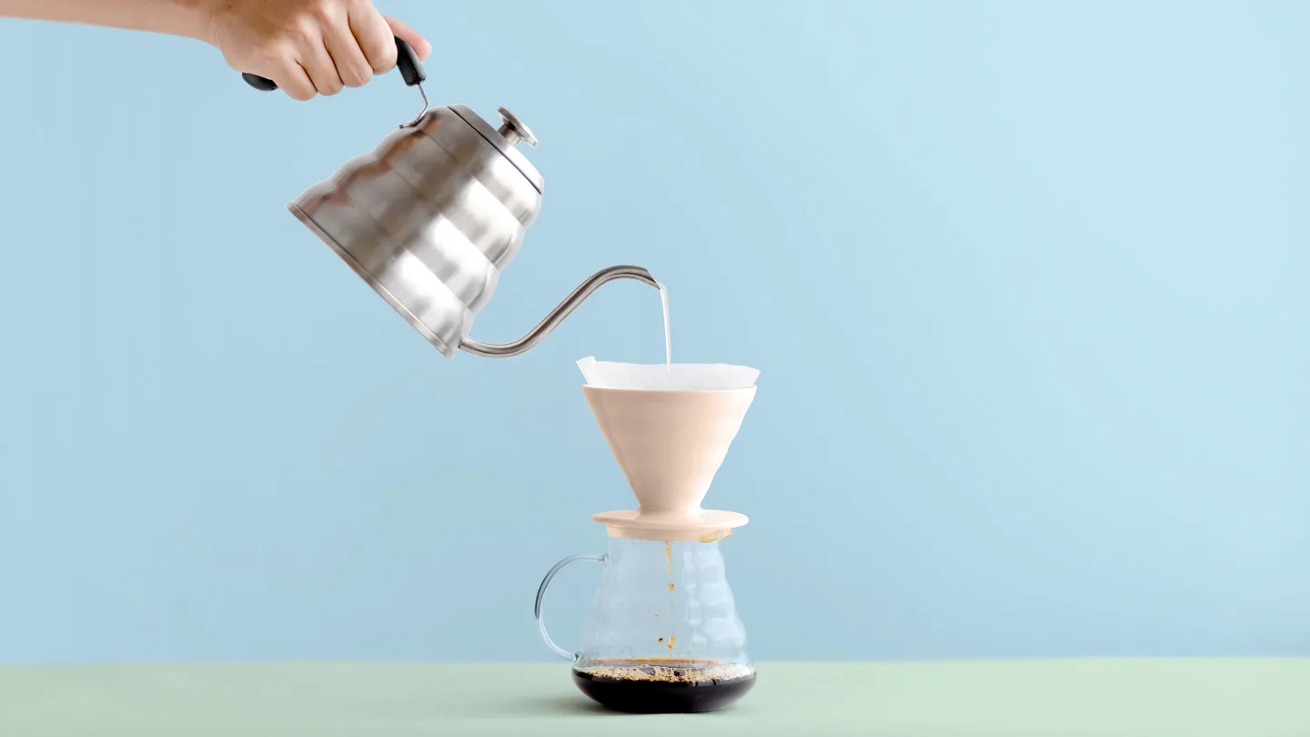 hand pouring hand-drip coffee