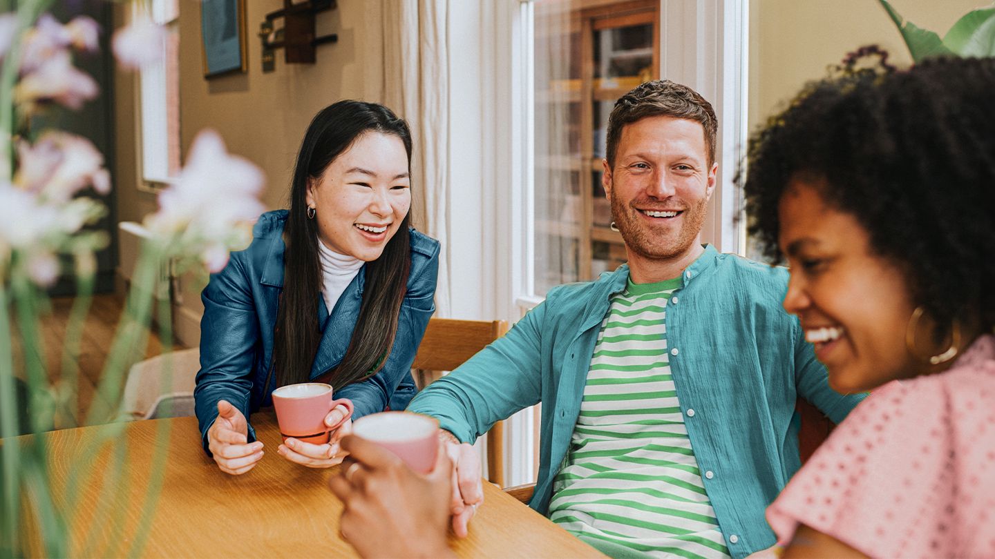 a group of friends catching up at a cafe