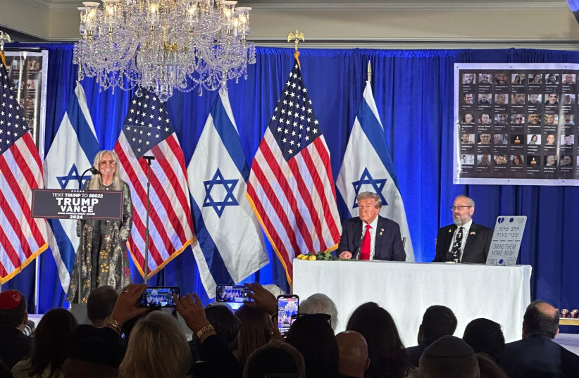 Yehuda Kaploun and Donald Trump listen to Miriam Adelson speak at a Trump campaign event.